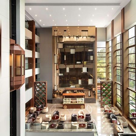 Radisson Blu Atria Bengaluru Hotel Exterior photo The lobby of the hotel