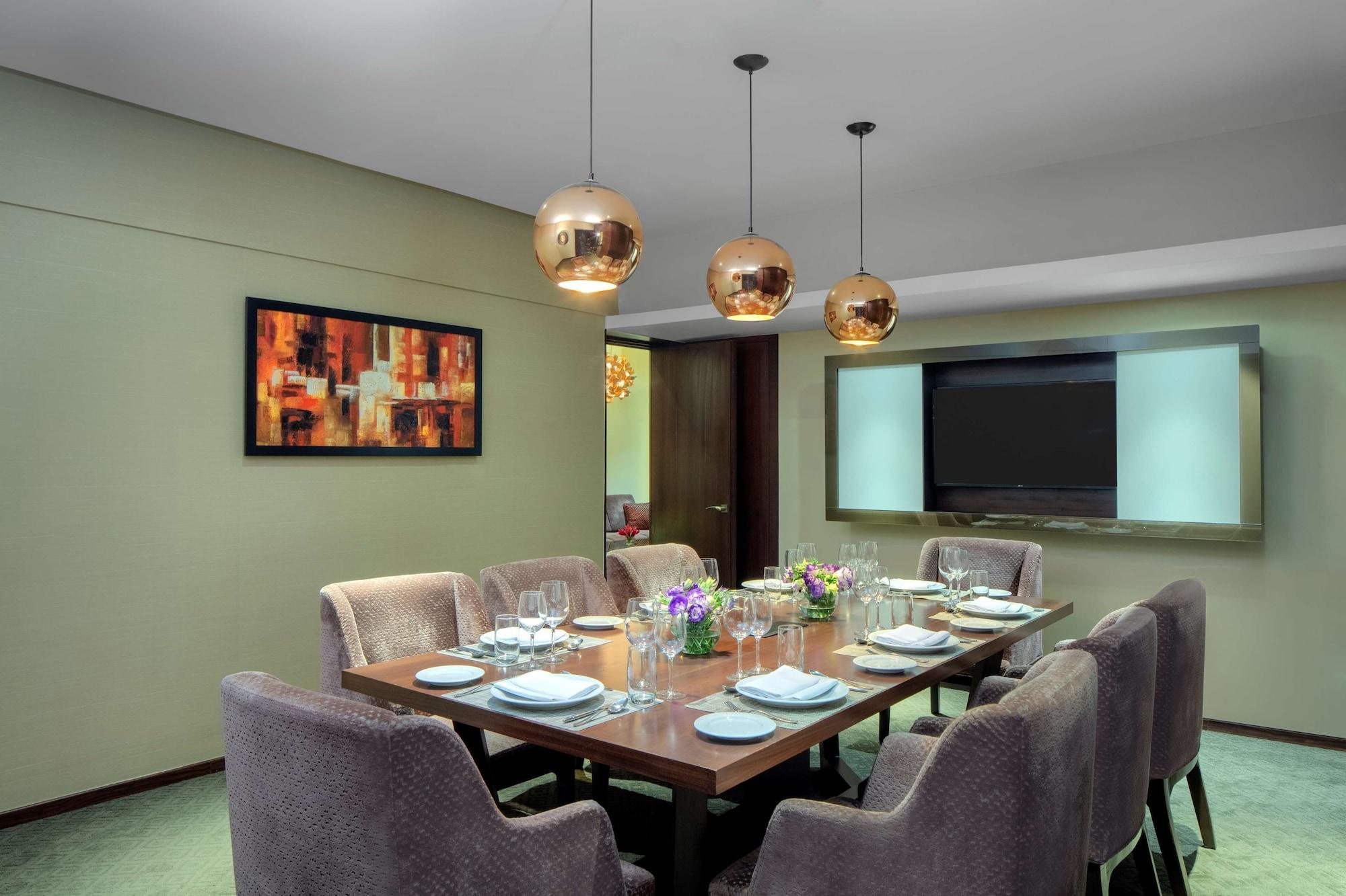 Radisson Blu Atria Bengaluru Hotel Exterior photo A private dining room at the hotel