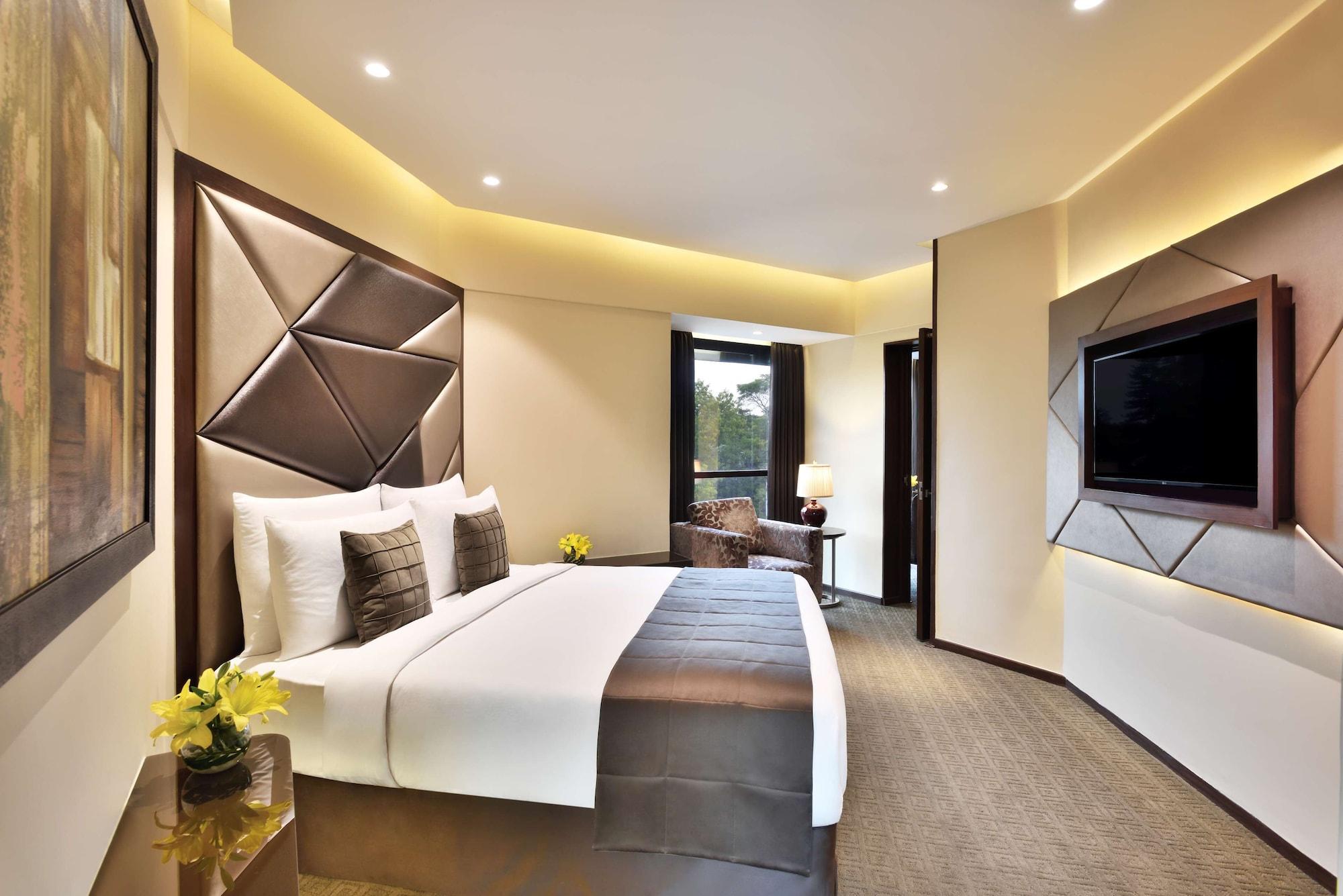 Radisson Blu Atria Bengaluru Hotel Exterior photo A room at the hotel