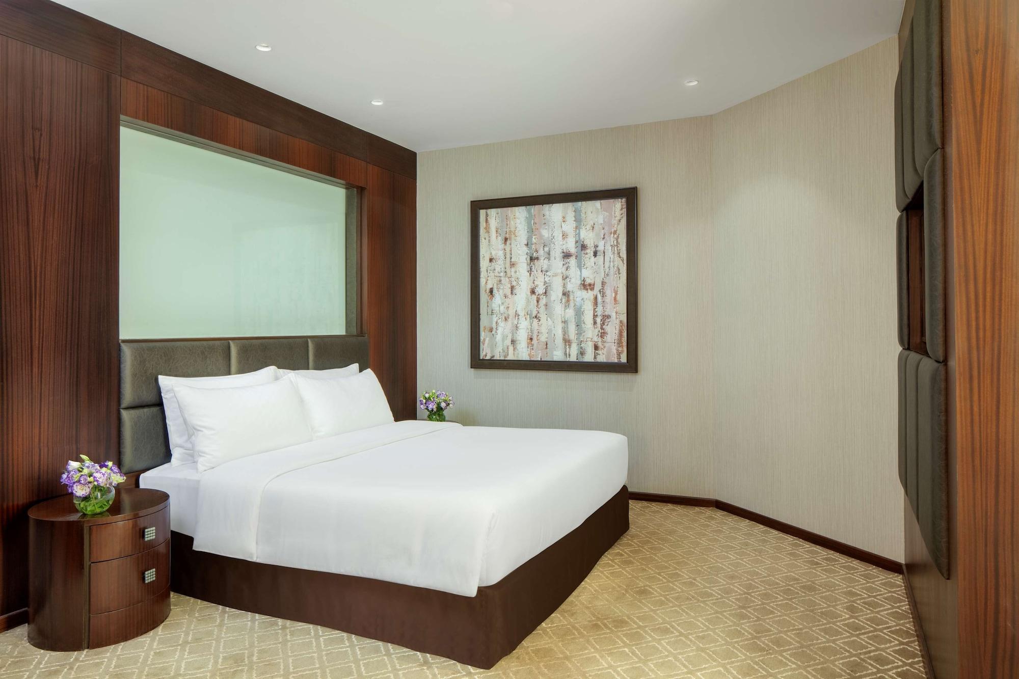 Radisson Blu Atria Bengaluru Hotel Exterior photo A bedroom at the hotel