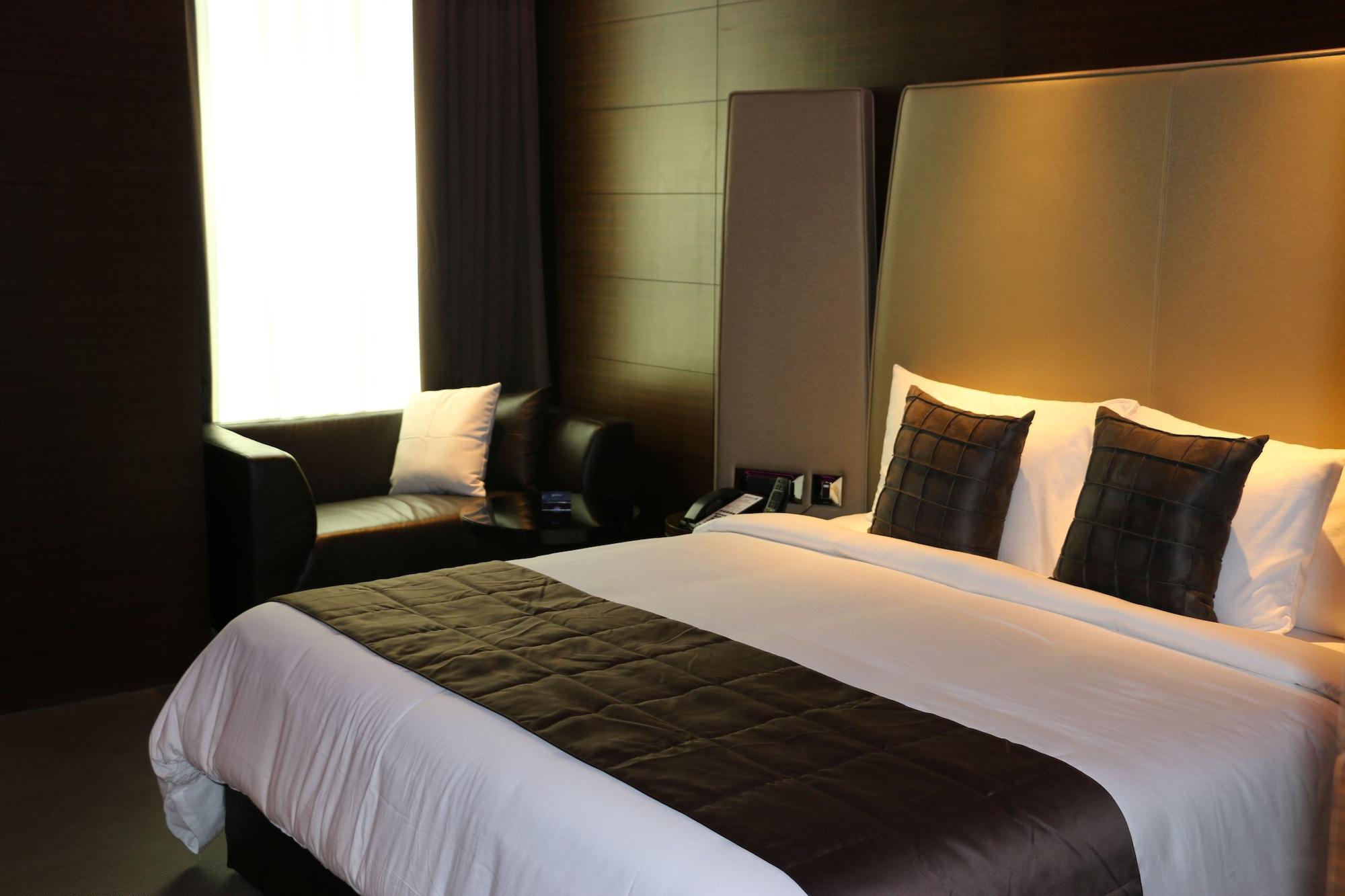 Radisson Blu Atria Bengaluru Hotel Exterior photo A bedroom at the hotel