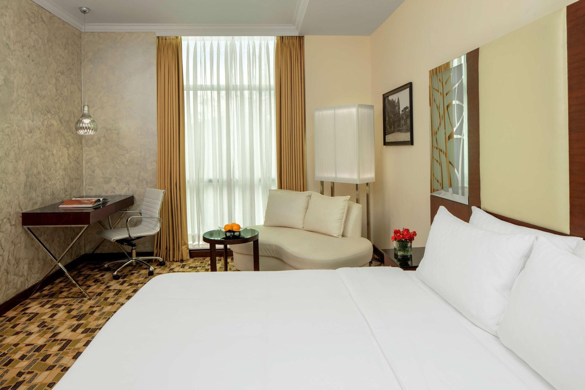 Radisson Blu Atria Bengaluru Hotel Exterior photo A room at the hotel