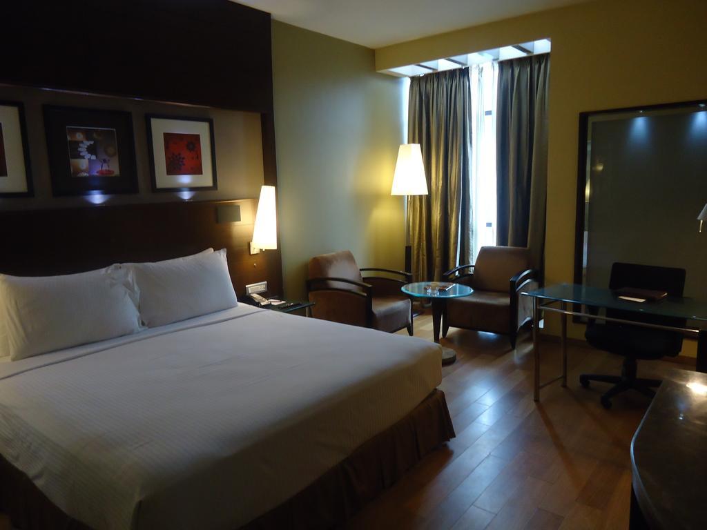 Radisson Blu Atria Bengaluru Hotel Exterior photo A room at the hotel
