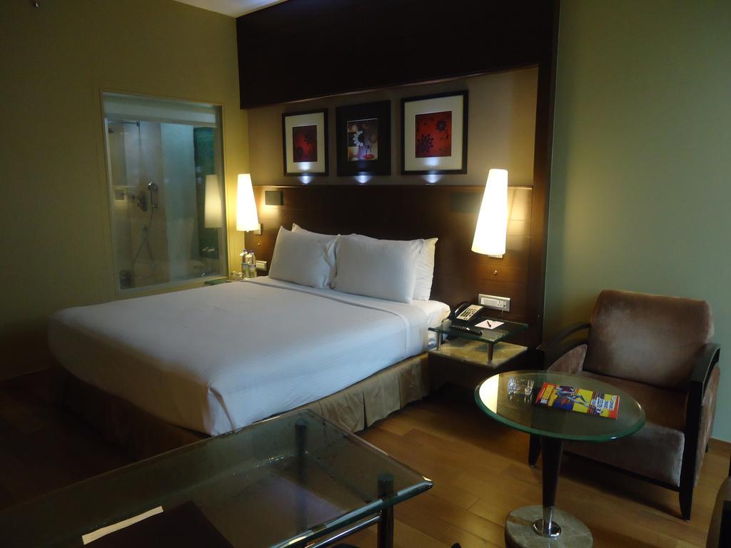 Radisson Blu Atria Bengaluru Hotel Exterior photo A room at the hotel