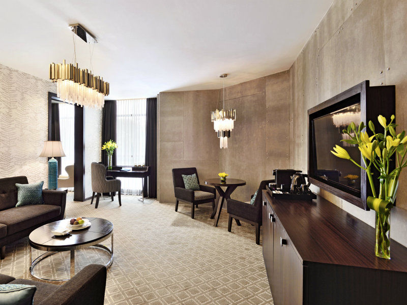Radisson Blu Atria Bengaluru Hotel Exterior photo A suite at the hotel