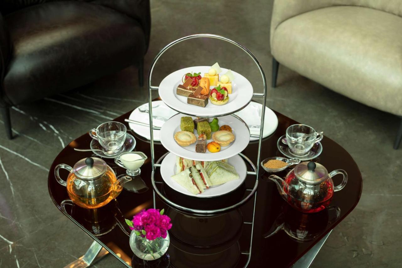 Radisson Blu Atria Bengaluru Hotel Exterior photo Afternoon tea at the InterContinental Hotel, London
