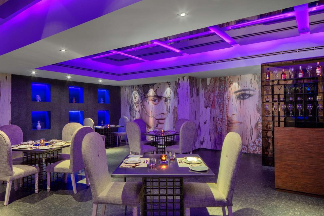 Radisson Blu Atria Bengaluru Hotel Exterior photo The interior of the restaurant